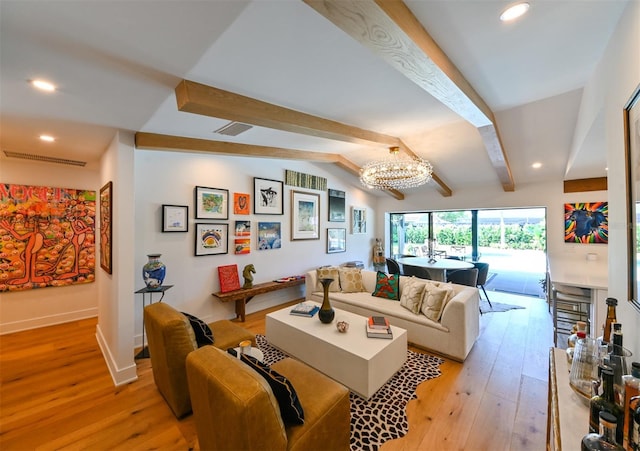 13916 Wellesford Way, Tampa, FL 33624 - living area with a chandelier, light wood finished floors, recessed lighting, and baseboards