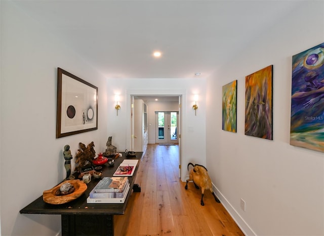 13916 Wellesford Way, Tampa, FL 33624 - hallway featuring light wood-type flooring, french doors, baseboards, and recessed lighting