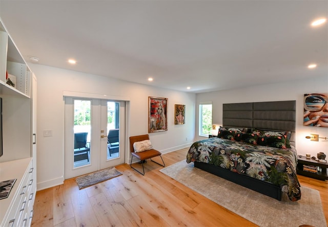 13916 Wellesford Way, Tampa, FL 33624 - bedroom with access to outside, french doors, light wood-style floors, recessed lighting, and baseboards