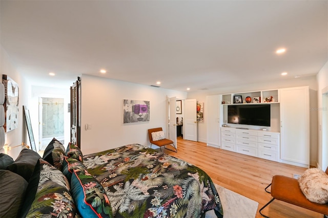 13916 Wellesford Way, Tampa, FL 33624 - bedroom featuring light wood finished floors and recessed lighting