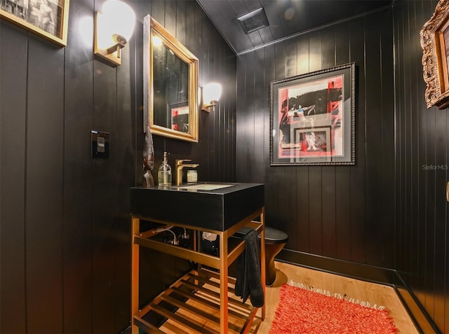 13916 Wellesford Way, Tampa, FL 33624 - bar with a sink and wood finished floors