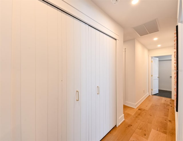 13916 Wellesford Way, Tampa, FL 33624 - hall with light wood finished floors, recessed lighting, and baseboards