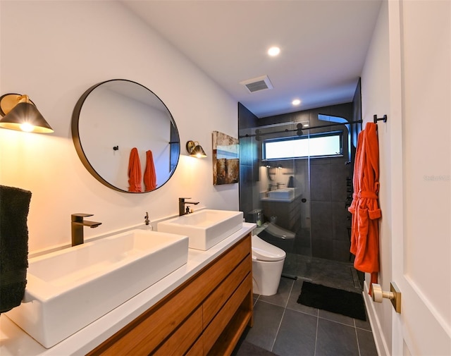 13916 Wellesford Way, Tampa, FL 33624 - full bath with toilet, a stall shower, tile patterned floors, double vanity, and recessed lighting