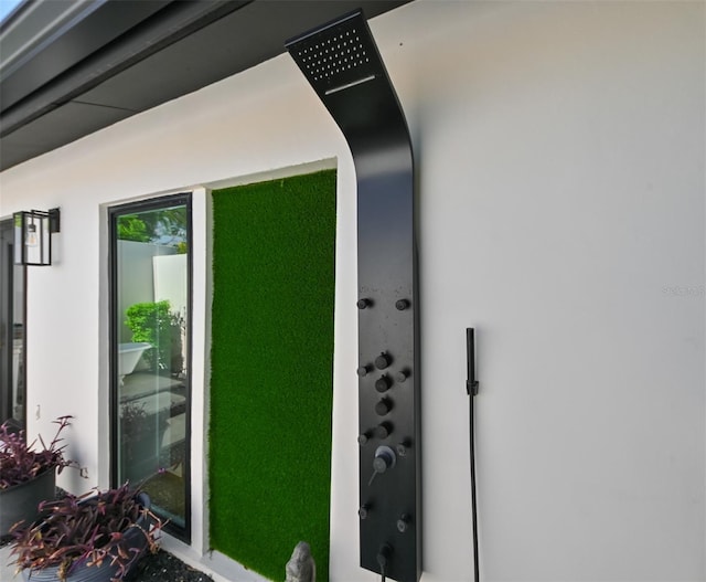 13916 Wellesford Way, Tampa, FL 33624 - detailed view of stucco siding