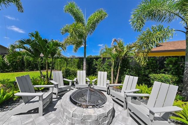 13916 Wellesford Way, Tampa, FL 33624 - view of patio / terrace with an outdoor fire pit