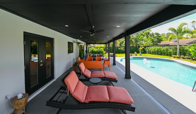 13916 Wellesford Way, Tampa, FL 33624 - outdoor pool with a patio area and a ceiling fan