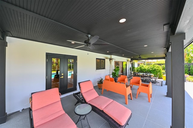 13916 Wellesford Way, Tampa, FL 33624 - view of patio / terrace featuring french doors, outdoor dining space, and a ceiling fan