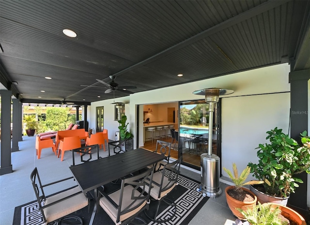 13916 Wellesford Way, Tampa, FL 33624 - view of patio / terrace featuring outdoor dining space and ceiling fan