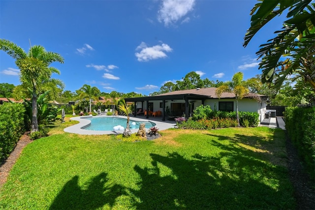 13916 Wellesford Way, Tampa, FL 33624 - outdoor pool featuring a yard and a patio area
