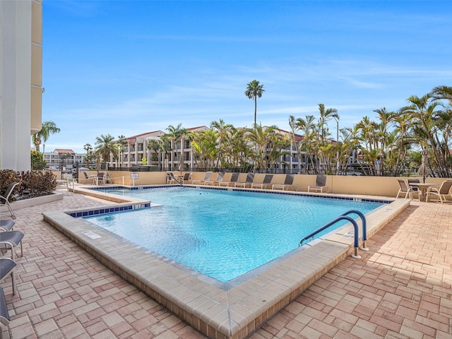 830 S Gulfview Blvd Unit 102, Clearwater Beach, FL 33767 - community pool featuring a patio