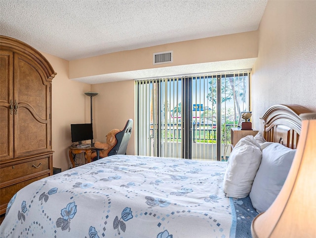 830 S Gulfview Blvd Unit 102, Clearwater Beach, FL 33767 - bedroom with a textured ceiling