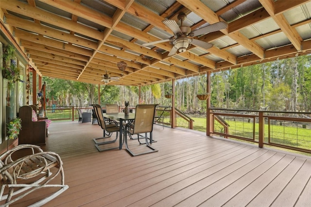5817 Myrtle Ln, Tampa, FL 33625 - wooden terrace with outdoor dining area and a ceiling fan