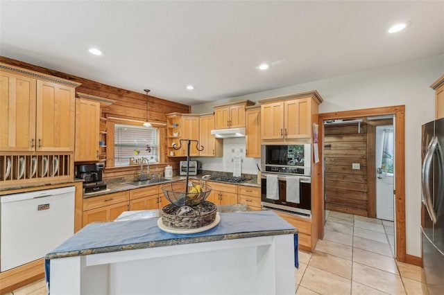 5817 Myrtle Ln, Tampa, FL 33625 - kitchen featuring stainless steel appliances, a sink, recessed lighting, open shelves, and a center island