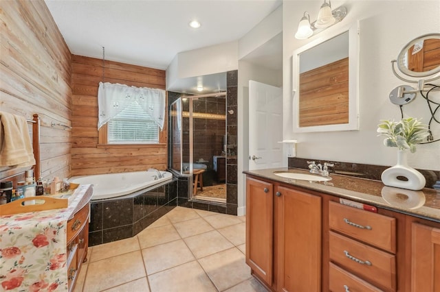 5817 Myrtle Ln, Tampa, FL 33625 - full bath featuring vanity, tile patterned floors, a shower stall, a garden tub, and wood walls