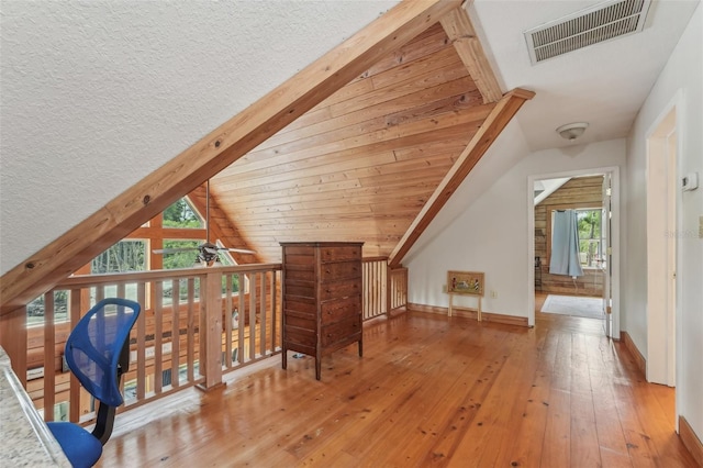 5817 Myrtle Ln, Tampa, FL 33625 - bonus room with hardwood / wood-style flooring, vaulted ceiling, and baseboards