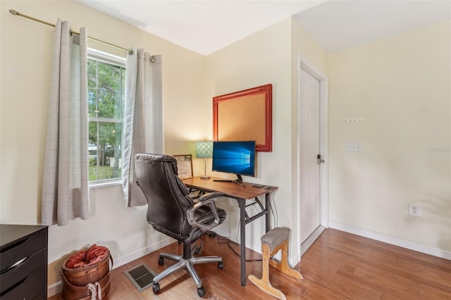 5817 Myrtle Ln, Tampa, FL 33625 - office featuring baseboards and wood finished floors