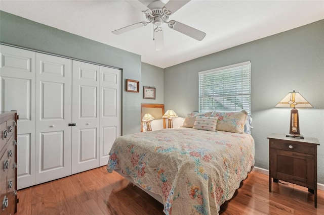 5817 Myrtle Ln, Tampa, FL 33625 - bedroom featuring a closet, wood finished floors, a ceiling fan, and baseboards