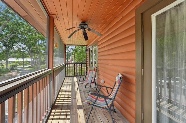 5817 Myrtle Ln, Tampa, FL 33625 - balcony featuring ceiling fan