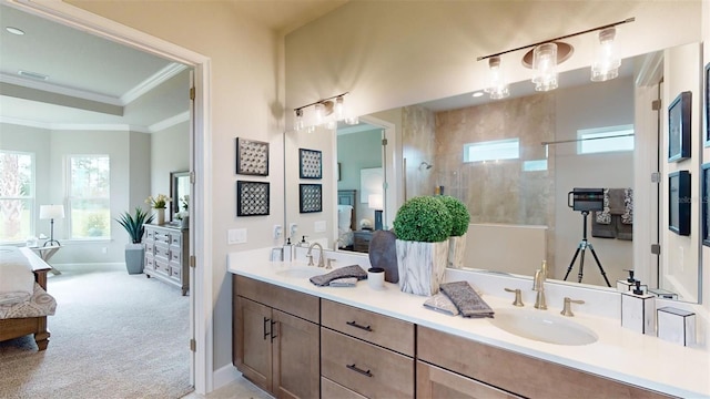 426 Bourganville Dr, Palm Coast, FL 32137 - full bath with connected bathroom, ornamental molding, plenty of natural light, walk in shower, and double vanity