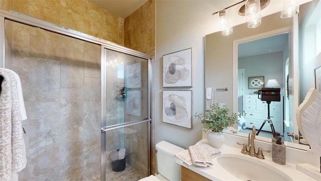 426 Bourganville Dr, Palm Coast, FL 32137 - bathroom featuring a shower stall, toilet, and vanity