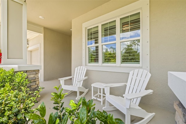 4166 Epic Cv, Land O Lakes, FL 34638 - view of patio / terrace with a porch