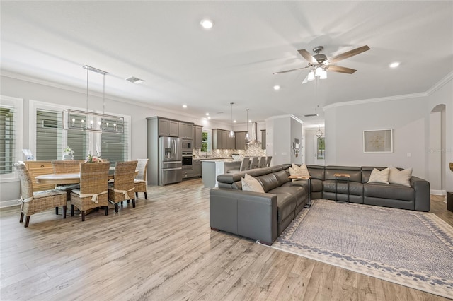 4166 Epic Cv, Land O Lakes, FL 34638 - living area featuring ornamental molding, light wood-style floors, ceiling fan, recessed lighting, and baseboards