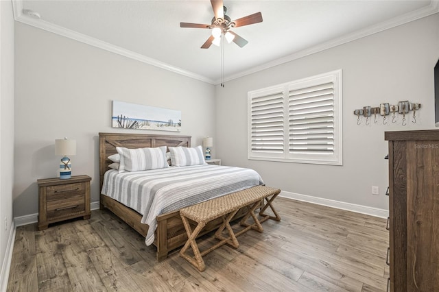 4166 Epic Cv, Land O Lakes, FL 34638 - bedroom featuring ornamental molding, baseboards, wood finished floors, and a ceiling fan