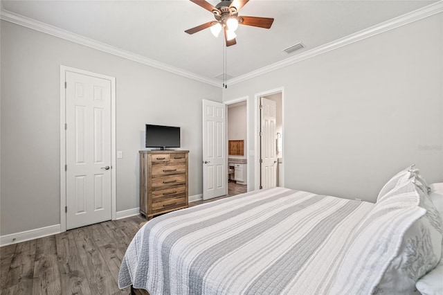 4166 Epic Cv, Land O Lakes, FL 34638 - bedroom with crown molding, wood finished floors, baseboards, and a ceiling fan