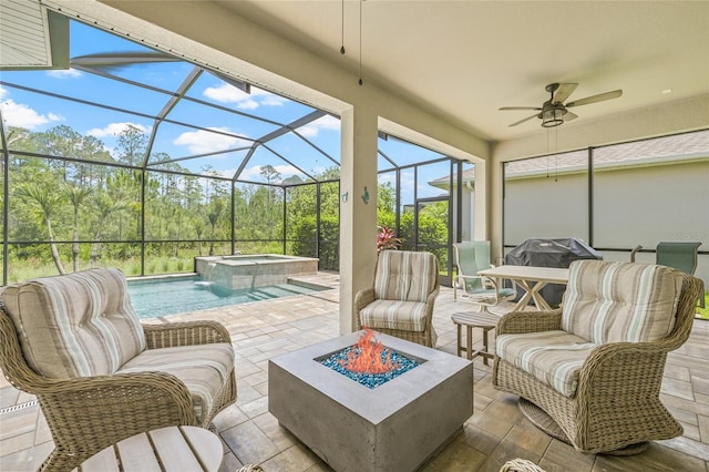 4166 Epic Cv, Land O Lakes, FL 34638 - view of patio featuring ceiling fan, glass enclosure, a pool with connected hot tub, and an outdoor living space with a fire pit