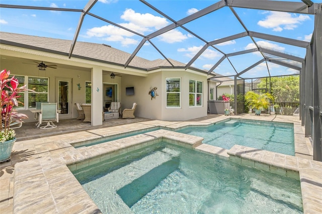 4166 Epic Cv, Land O Lakes, FL 34638 - view of pool featuring a ceiling fan, a pool with connected hot tub, a patio area, and a lanai