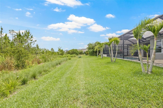 4166 Epic Cv, Land O Lakes, FL 34638 - view of green lawn featuring a lanai