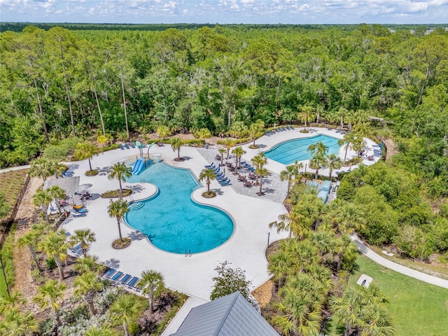 4166 Epic Cv, Land O Lakes, FL 34638 - view of swimming pool with a view of trees