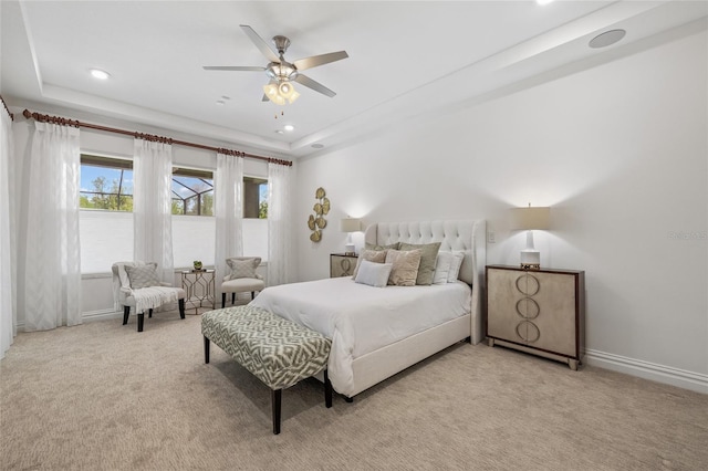 16712 Courtyard Loop, Land O Lakes, FL 34638 - bedroom with light carpet, a raised ceiling, recessed lighting, and baseboards