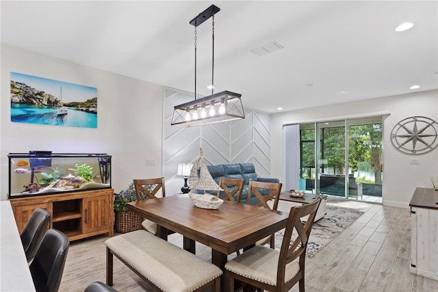 14110 Damselfly Dr, Tampa, FL 33625 - dining space featuring light wood-style floors, recessed lighting, and baseboards