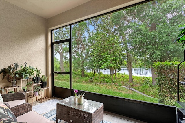 14110 Damselfly Dr, Tampa, FL 33625 - sunroom / solarium featuring a water view and view of wooded area