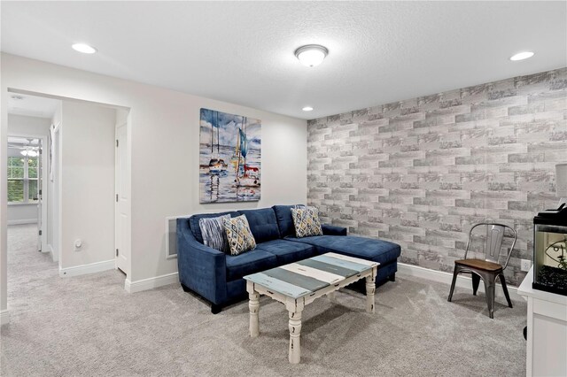 14110 Damselfly Dr, Tampa, FL 33625 - carpeted living area featuring baseboards, a textured ceiling, and recessed lighting