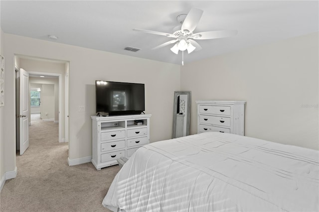 14110 Damselfly Dr, Tampa, FL 33625 - bedroom featuring light carpet, baseboards, and a ceiling fan
