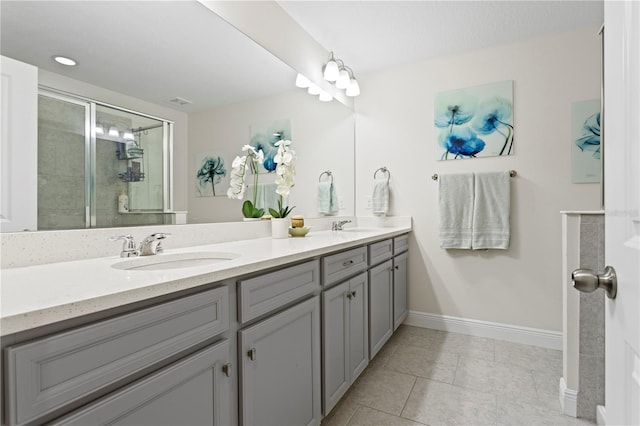 14110 Damselfly Dr, Tampa, FL 33625 - full bath with a stall shower, baseboards, double vanity, and tile patterned floors