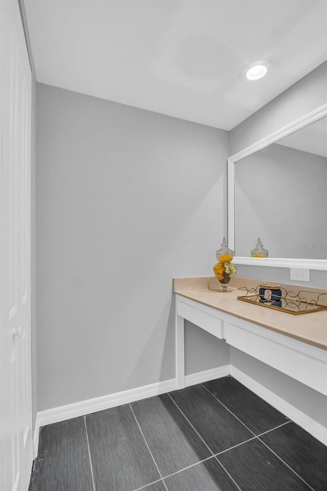 detailed view of wood finished floors and baseboards