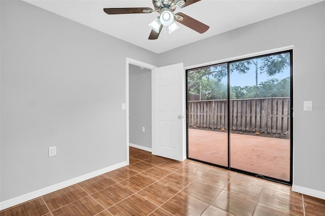 714 1st Ct, Palm Harbor, FL 34684 - spare room with baseboards, ceiling fan, and wood finished floors