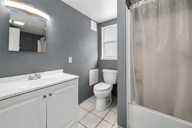629 Lexington St, Dunedin, FL 34698 - bathroom with vanity, tile patterned floors, and shower / bath combo with shower curtain