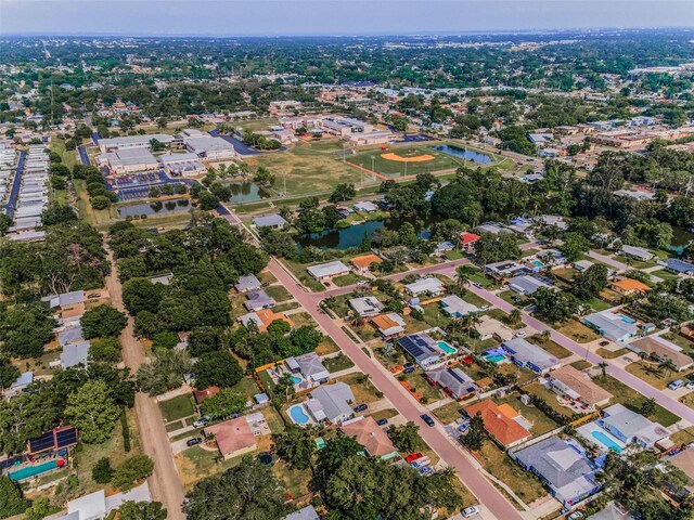 629 Lexington St, Dunedin, FL 34698 - aerial overview of property's location with a nearby body of water and nearby suburban area
