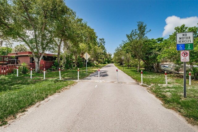 629 Lexington St, Dunedin, FL 34698 - view of road featuring traffic signs