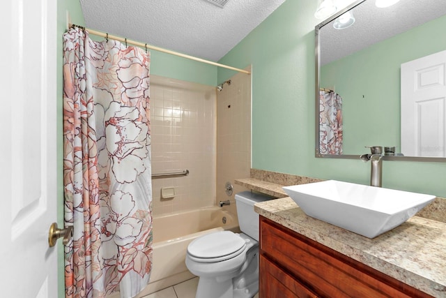 bathroom with a textured ceiling, vanity, shower / bath combination with curtain, toilet, and tile patterned floors