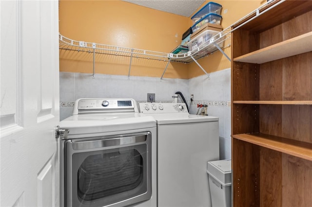 1020 85th Ave N Unit 223, Saint Petersburg, FL 33702 - clothes washing area with independent washer and dryer