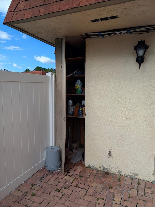 8114 Oak Trace Way Unit D, Tampa, FL 33634 - exterior space featuring stucco siding