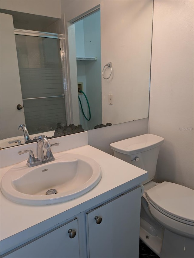 8114 Oak Trace Way Unit D, Tampa, FL 33634 - full bath with toilet, a stall shower, and vanity