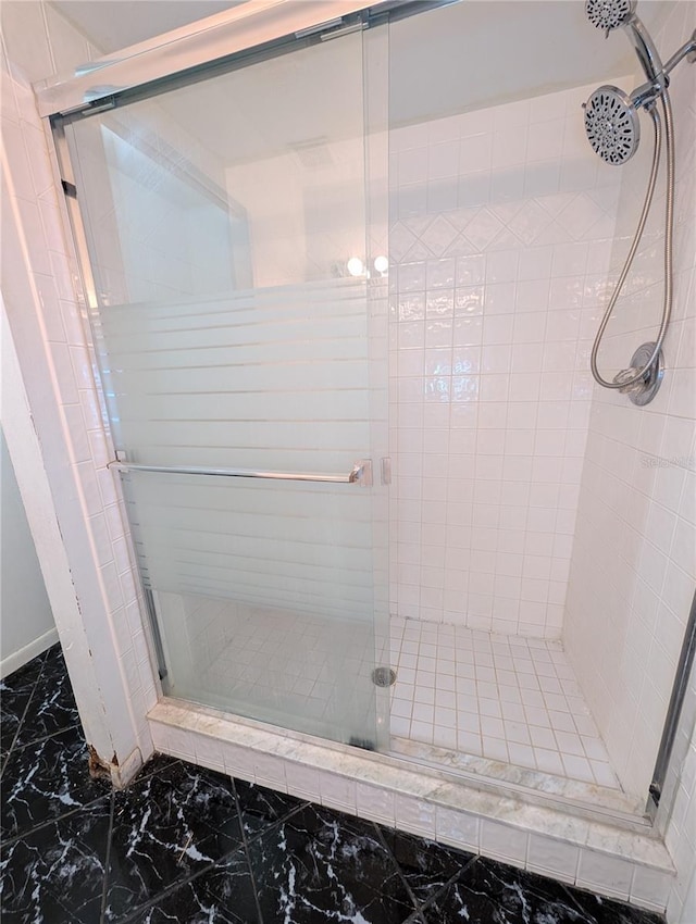 8114 Oak Trace Way Unit D, Tampa, FL 33634 - full bathroom featuring marble finish floors and a shower stall