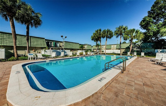 1799 N Highland Ave Unit 106, Clearwater, FL 33755 - community pool with fence and a patio area