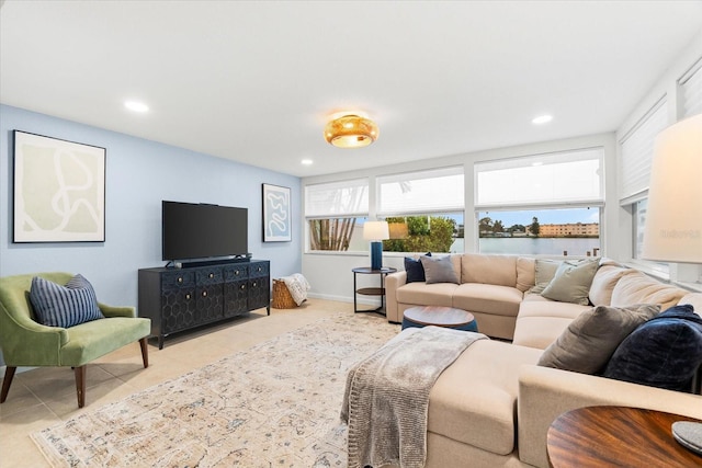 8848 Sunlit Cove Dr NE, Saint Petersburg, FL 33702 - tiled living room featuring plenty of natural light and recessed lighting